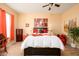 Spacious bedroom with wood floors and red accents at 14575 W Mountain View Blvd # 11309, Surprise, AZ 85374