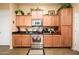 Modern kitchen with stainless steel appliances and granite countertops at 14575 W Mountain View Blvd # 11309, Surprise, AZ 85374