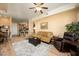 Open living area with hardwood floors, and kitchen view at 14575 W Mountain View Blvd # 11309, Surprise, AZ 85374