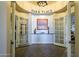 Elegant lobby entrance with artwork and seating at 14575 W Mountain View Blvd # 11309, Surprise, AZ 85374