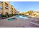 Inviting pool and spa area with lounge chairs, perfect for relaxation at 14575 W Mountain View Blvd # 11309, Surprise, AZ 85374