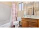 Bathroom with tub, toilet and vanity at 14820 W Verde Ln, Goodyear, AZ 85395