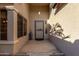 Front entry with security door and tile flooring at 14820 W Verde Ln, Goodyear, AZ 85395