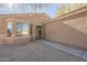 Side view of a house, showing entryway and window at 1743 E Amber Ln, Gilbert, AZ 85296