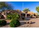 Spanish style home with mature desert landscaping at 19132 E Via Esquina --, Rio Verde, AZ 85263