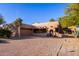 Front view of Spanish style home with flagpole at 19132 E Via Esquina --, Rio Verde, AZ 85263