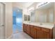 Double vanity bathroom with access to bedroom at 21320 N 56Th St # 2175, Phoenix, AZ 85054