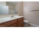 Bathroom boasts a vanity with sink, toilet and shower at 21320 N 56Th St # 2175, Phoenix, AZ 85054