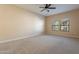 Large bedroom with ceiling fan and neutral decor at 21320 N 56Th St # 2175, Phoenix, AZ 85054