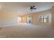 Living room with access to balcony and large windows at 21320 N 56Th St # 2175, Phoenix, AZ 85054
