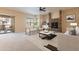 Bright living room with stone fireplace, and access to balcony at 21320 N 56Th St # 2175, Phoenix, AZ 85054