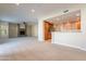 Spacious living room with fireplace and kitchen views at 21320 N 56Th St # 2175, Phoenix, AZ 85054