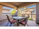 Relaxing patio features a table and chairs, great for outdoor dining at 21320 N 56Th St # 2175, Phoenix, AZ 85054