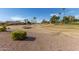 Backyard view of desert landscaping and golf course at 21906 N Dusty Trail Blvd, Sun City West, AZ 85375