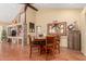 Dining room with hardwood floors and wooden table with chairs at 25820 S Beech Creek Dr, Sun Lakes, AZ 85248