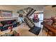 Living room, staircase, and view into dining area at 2920 E Clarendon Ave, Phoenix, AZ 85016