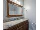 Bathroom with granite countertop, wood cabinet, and large mirror at 3091 E Morrison Ranch Pkwy, Gilbert, AZ 85296