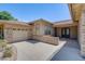 Front view of the home, highlighting the stone accents and double front doors at 3091 E Morrison Ranch Pkwy, Gilbert, AZ 85296