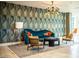 Modern building lobby with stylish seating and unique wall decor at 3131 N Central Ave # 6022, Phoenix, AZ 85012