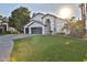 Two-story house with a two-car garage and well-maintained lawn at 3370 S Pleasant Pl, Chandler, AZ 85248