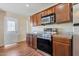 Modern kitchen with stainless steel appliances and granite countertops at 3548 W Frier Dr, Phoenix, AZ 85051