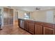 Kitchen island with granite countertops and stainless steel dishwasher at 3548 W Frier Dr, Phoenix, AZ 85051
