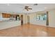 Bright and spacious living room with hardwood floors and ceiling fan at 3548 W Frier Dr, Phoenix, AZ 85051