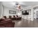 Living room with a large sectional sofa and built-in entertainment center at 3902 E Wildhorse Dr, Gilbert, AZ 85297