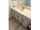 Bathroom with single vanity and laminate flooring at 540 N May St # 2109, Mesa, AZ 85201