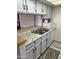 Updated kitchen features granite countertops and modern appliances at 540 N May St # 2109, Mesa, AZ 85201