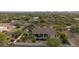 Aerial view of house, pool, and surrounding landscape at 730 E Mesquite St, Phoenix, AZ 85086