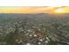 Aerial view showcasing a house with a pool and desert landscape at 730 E Mesquite St, Phoenix, AZ 85086