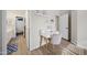 Cozy bedroom with built-in desk and view into bathroom at 730 E Mesquite St, Phoenix, AZ 85086