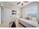Well-lit bedroom with a king-size bed and closet at 730 E Mesquite St, Phoenix, AZ 85086