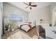 Bright bedroom with a queen-size bed and ample closet space at 730 E Mesquite St, Phoenix, AZ 85086