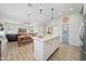 Island kitchen with granite countertops and stainless steel appliances at 730 E Mesquite St, Phoenix, AZ 85086