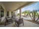 Relaxing covered patio with comfortable seating and pool views at 730 E Mesquite St, Phoenix, AZ 85086