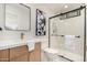 Modern bathroom with walk-in shower, quartz vanity, and updated fixtures at 8614 E Starlight Way, Scottsdale, AZ 85250