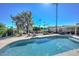 Inviting swimming pool with surrounding patio and landscaping at 11041 N 44Th St, Phoenix, AZ 85028