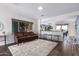 Living room with leather couch and open kitchen view at 11163 E New Frontier Ct, Gold Canyon, AZ 85118