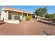 Landscaped backyard with gravel and mature trees at 14727 W Via Manana --, Sun City West, AZ 85375