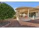 Covered patio with seating area, perfect for outdoor entertaining at 14727 W Via Manana --, Sun City West, AZ 85375