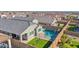 Aerial view showing a house with a pool, swing set, and backyard at 19027 W Sierra St, Surprise, AZ 85388