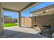 Backyard patio with artificial turf and a playset at 19027 W Sierra St, Surprise, AZ 85388