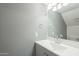 Bathroom features a vanity with a sink and a mirror at 2301 E University Dr # 339, Mesa, AZ 85213