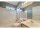 Bathroom with a tub, toilet and sink at 2301 E University Dr # 339, Mesa, AZ 85213