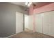 Bedroom with double door closet and carpeting at 2301 E University Dr # 339, Mesa, AZ 85213