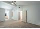 Spacious carpeted bedroom with access to the bathroom at 2301 E University Dr # 339, Mesa, AZ 85213
