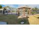 Community pool area with brick pergola at 2301 E University Dr # 339, Mesa, AZ 85213