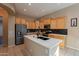 Modern kitchen with stainless steel appliances and white quartz countertops at 27204 N 86Th Dr, Peoria, AZ 85383